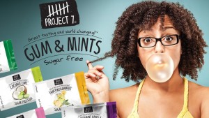 Advertisement for Project 7 chewing gum with woman blowing bubble